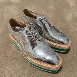 Prada Silver Platform Brogues